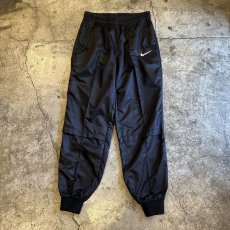 画像1: 【NIKE】POINT EMBROIDERY DESIGN NYLON JOGGER PANTS / W25~W33 (1)