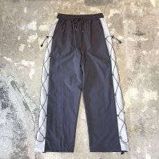 画像1: 【WONDERGROUND】SIDE COLOR LACE UP WIDE NYLON PANTS / GREY / OS (1)