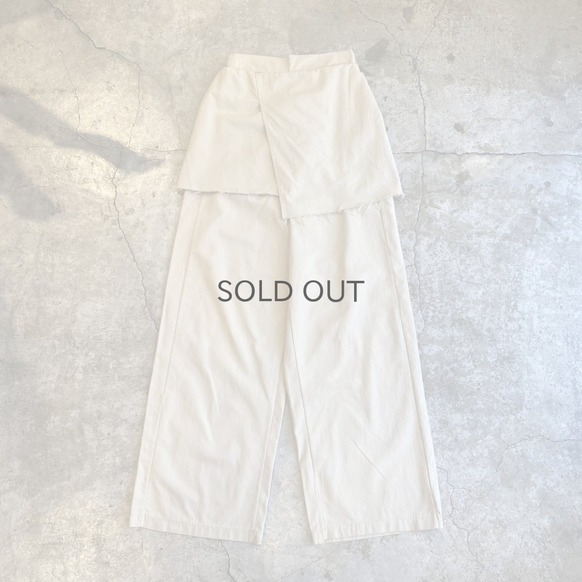 画像1: 【WONDERGROUND】CUT OFF WRAP SKIRT LAYERED PANTS / OS (1)