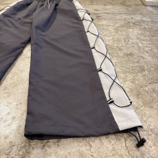画像4: 【WONDERGROUND】SIDE COLOR LACE UP WIDE NYLON PANTS / GREY / OS (4)
